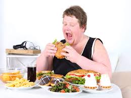 women eating junk food